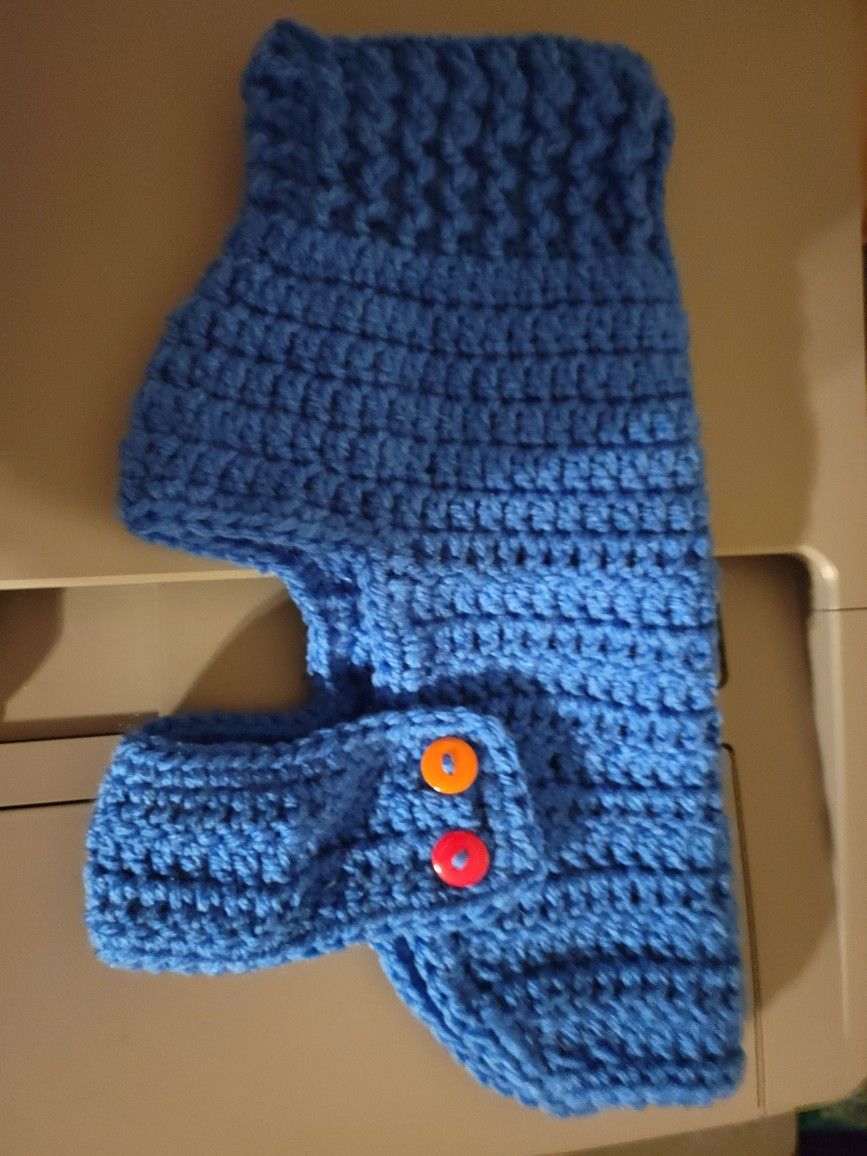 hand crocheted small pet sweater. i can make them in whatever color you prefer.