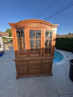 2-piece China Hutch ready to sell/trade before it rains!