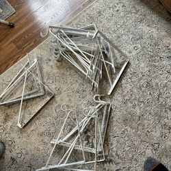 Heavy-duty slatwall shelf brackets in great condition.