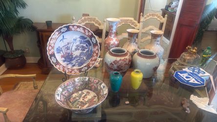 Asian vases, picture frames, and framed plates