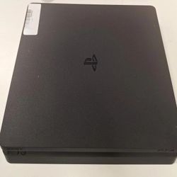 PLAYSTATION 4 SLIM + GAMES 