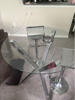 Glass silver high top table with stools and coasters