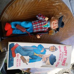 Antique Happy times wind up drunken doll