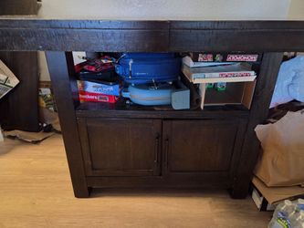 Wooden table with bench
