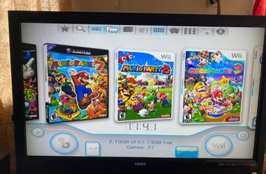 NINTENDO WII + 2500 GAMES INSTALLED