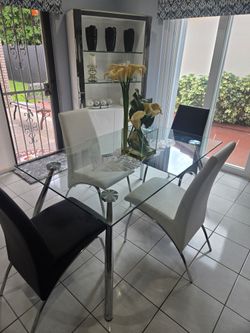 4 chairs and a table