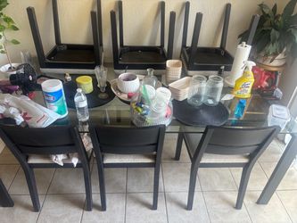 Glass table with 6 chairs