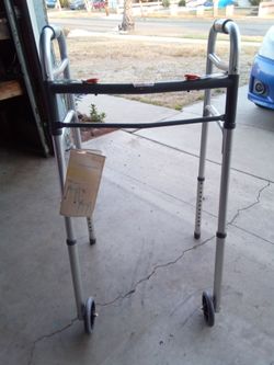 New adult walker with tags.never used.