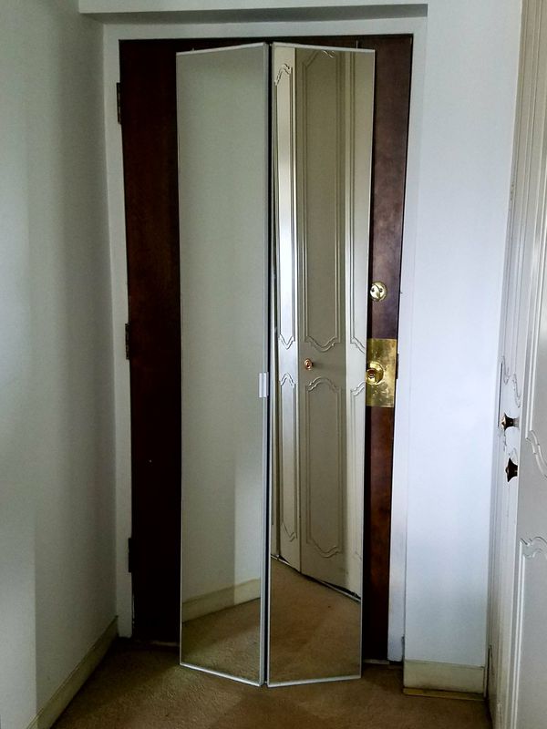 A Set of Two (2) Mirror Steel Bi-Fold Interior Closet Doors for Sale in