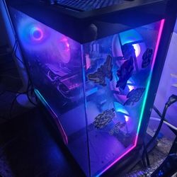 Gaming Pc With A Curved Ultrawide Monitor And Keyboard And Mouse. 