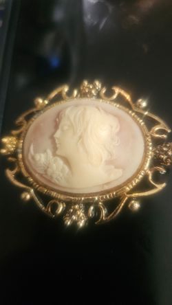 Victorian cameo on coral