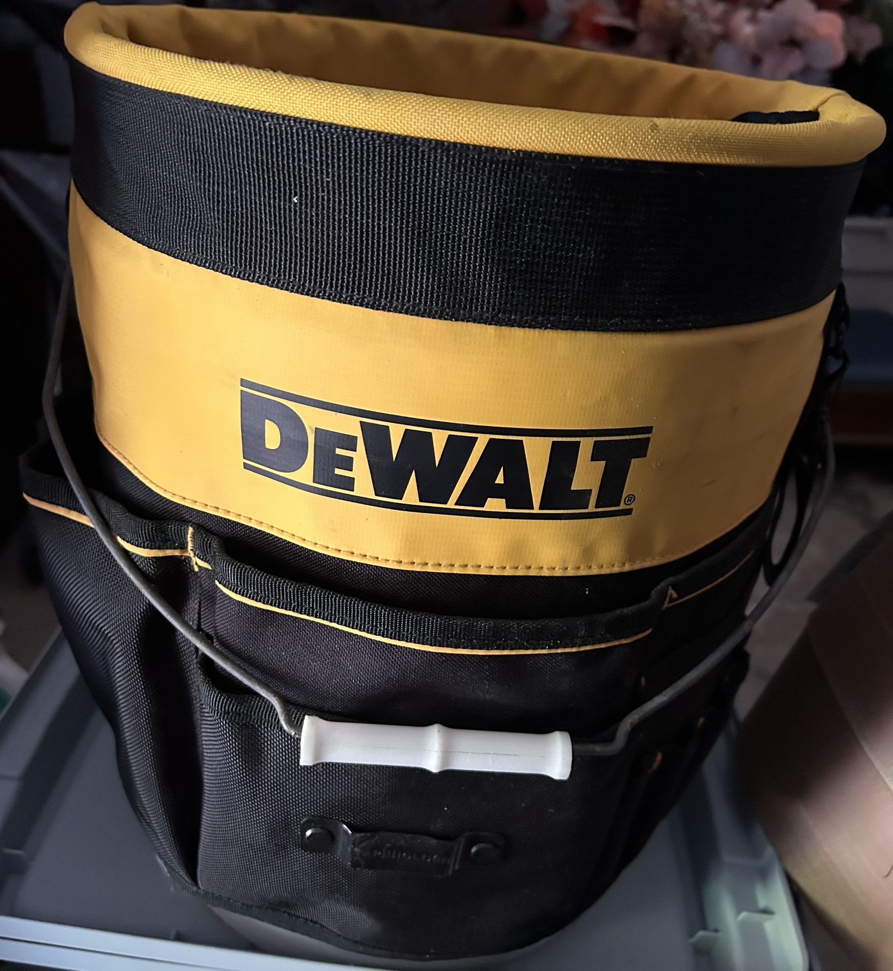DEWALT Bucket Tool Organizer (DWST560109). It's designed to fit on standard 5-gallon buckets, commonly found on jobsites. The organizer features 37