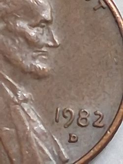 1982 D One cent penny, with Error,  open mouth, 3.1 gms.