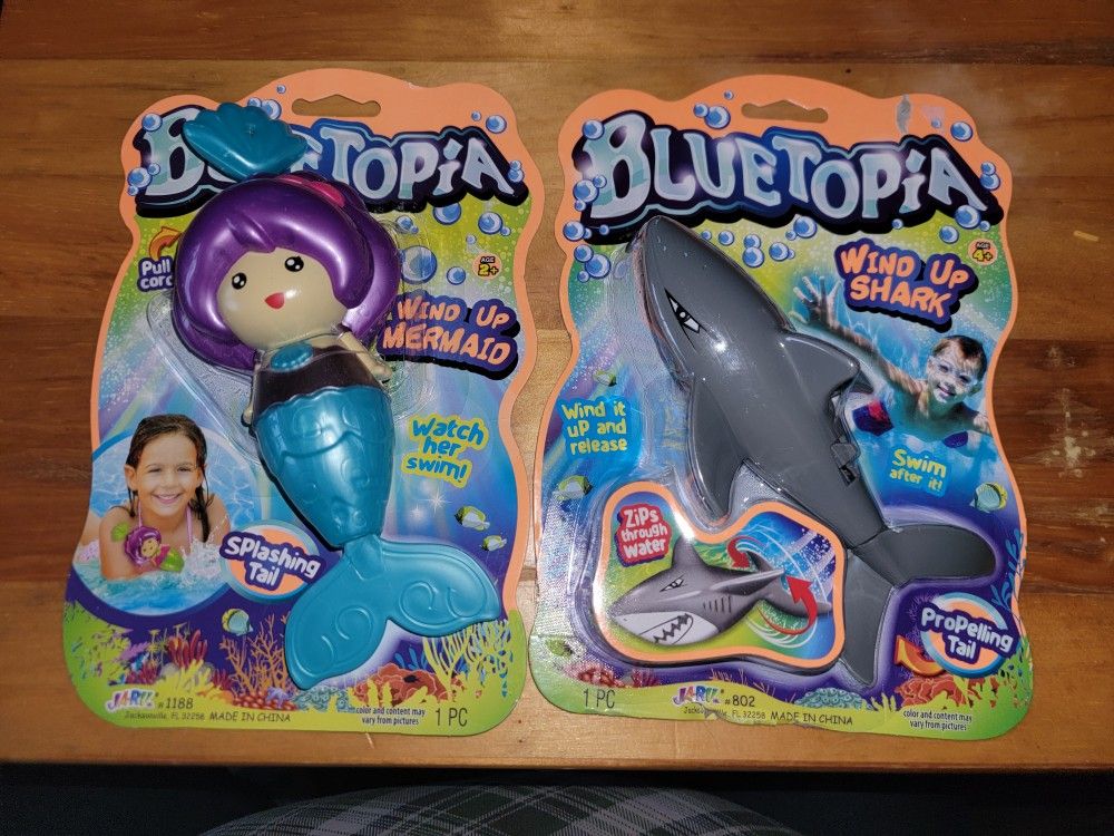 NEW SWIMMING MERMAID OR  SHARK WITH SPLASHING TAILS. FUN FOR BATH OR POOL