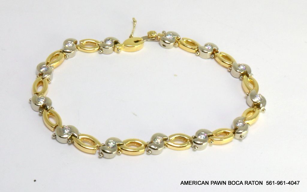 14K Two Tone Gold Swirl and Oval Link Diamond Bracelet tcw