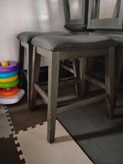 (4) Grey Ashley Furniture high-top table stools