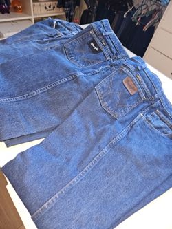 6 pairs of Wrangler jeans from Cavenders and 1 regular Jean.   There's 2  work jeans.  The wrangler jeans are a darker blue than what they appear on t