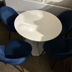 Table And 4 Chairs 