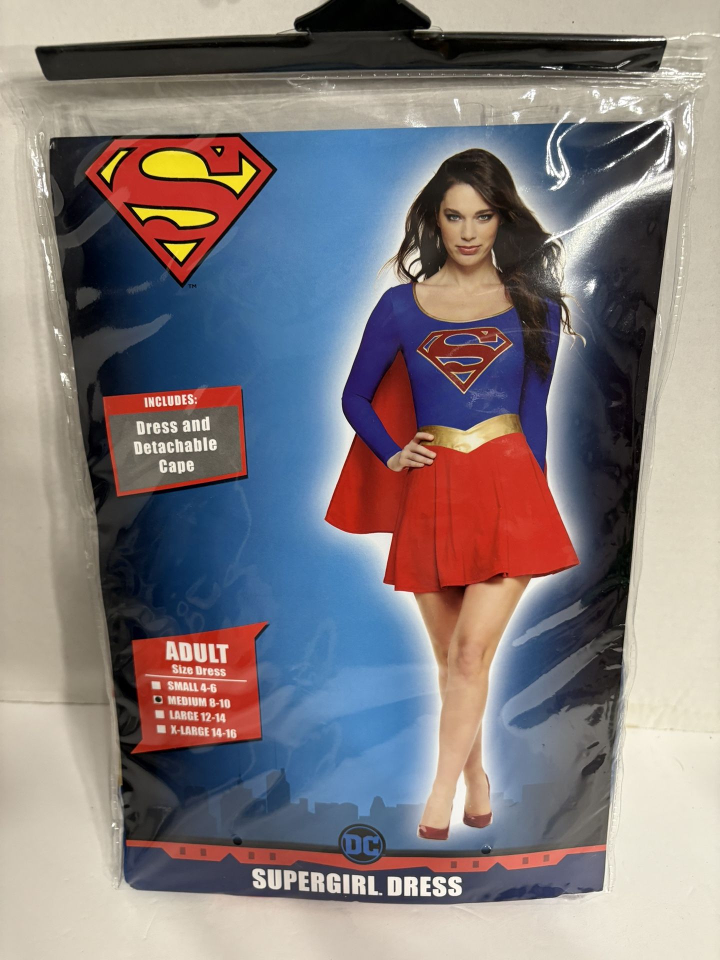 Supergirl Dress Women’s Medium (8-10) Adult Dress Halloween Dress New with tags, made china, 2 pc set, dress and detachable cape, brand DC Socks sold