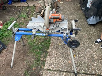 Ridged compound miter saw and stand