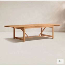 Extendable teak patio dining table