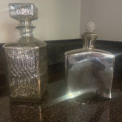 Two beautiful mercury glass decanters. 