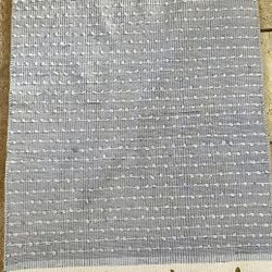 26 x 44” fringe area rug. Like new.