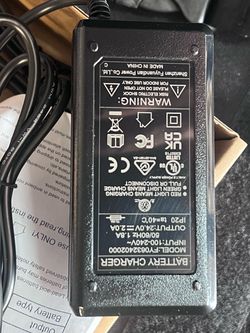 24V 2A Lead-Acid Battery Charger for Mobility Scooters and Electric Wheelchairs  ENGLISH  Title: 24V 2A Battery Charger for Mobility Scooter and Elect