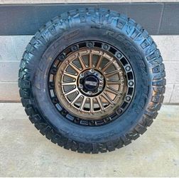 On Sale. METAL FX 17x8.5 6x135 bronze  wheels & 35x12.50-17 NITTO Ridge Grappler tires for FORD F150 & Raptor  (We Finance)