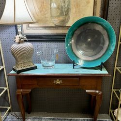 Three piece set console table, and two end tables.