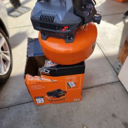 RIDGID 6 Gal. 150 PSI Portable Electric Oil-Free Jobsite Pancake Air Compressor with Dual Pressure Gauges and 2-Quick Couplers