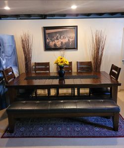 Dining table and chairs and bench