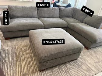 Gray sectional with studded bronze/gold detail around all sides in good condition - Smoke-free home