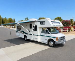 2000 Fleetwood jamboree 24ft rear bed