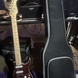 Donner DST-152 electric guitar with Boss Katana Mini amp