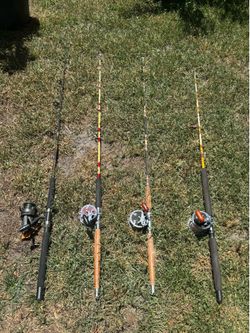 Vintage Penn and shimano fishing poles