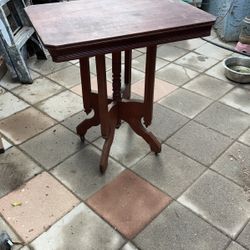 Antique Eastlake Parler Table With Wheels 