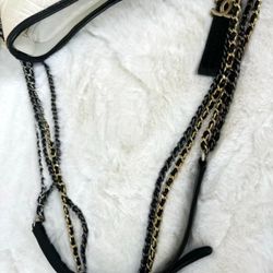 Chanel black and white panda black and gold chain bag
