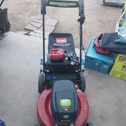 TORO LAWN MOWER 60V LITHIUM BRUSHLESS 22" AUTO DRIVE WITH BATTERY AND CHARGER 