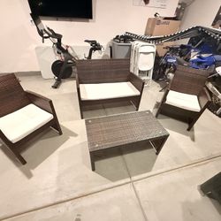 4pcs Wicker Chairs And Glass Top Table