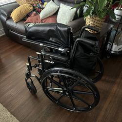 Wheelchair With Feet Holders