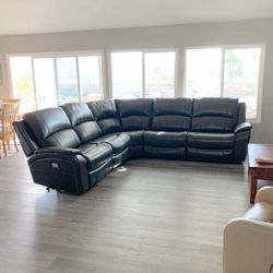 Large dark gray power recliner sectional