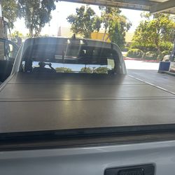 Bed cover for short bed