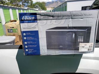 Oster microwave  *BRAND NEW*