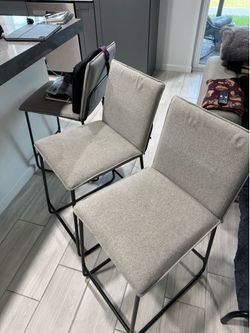 3 gray chairs