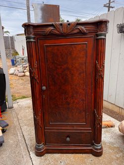 Tommy  bahama bar cabinet