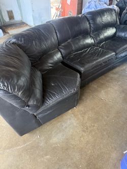 Black leather couches