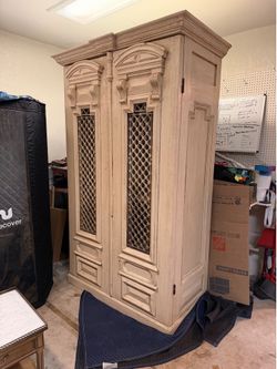 Rare Spanish Revival Hand-Carved Armoire – Architectural Statement Piece
