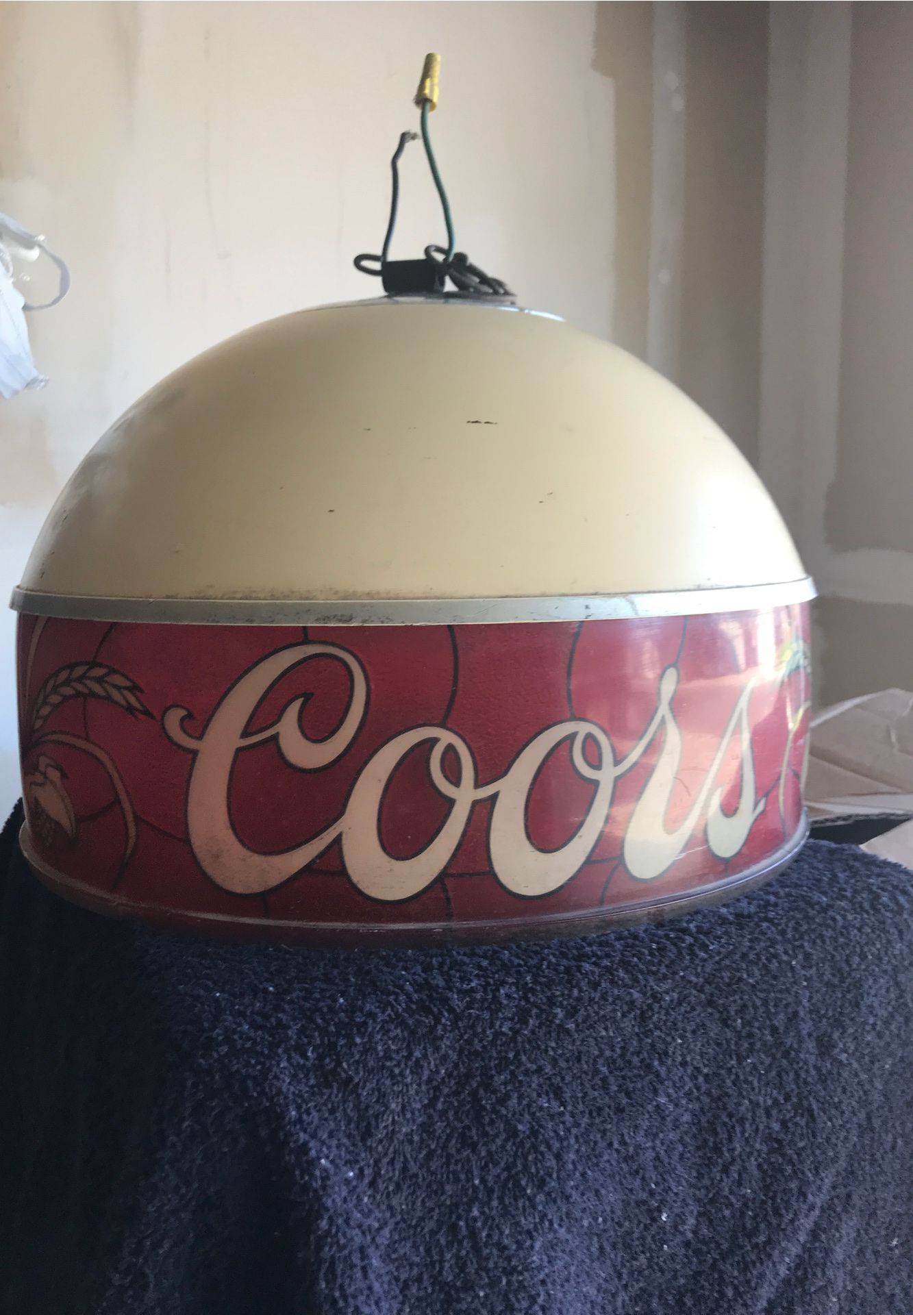 Antique Coors hanging ceiling lamp. Serious buyer only. No delivery