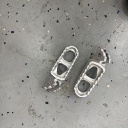 Oem Surron lbx pegs basically new